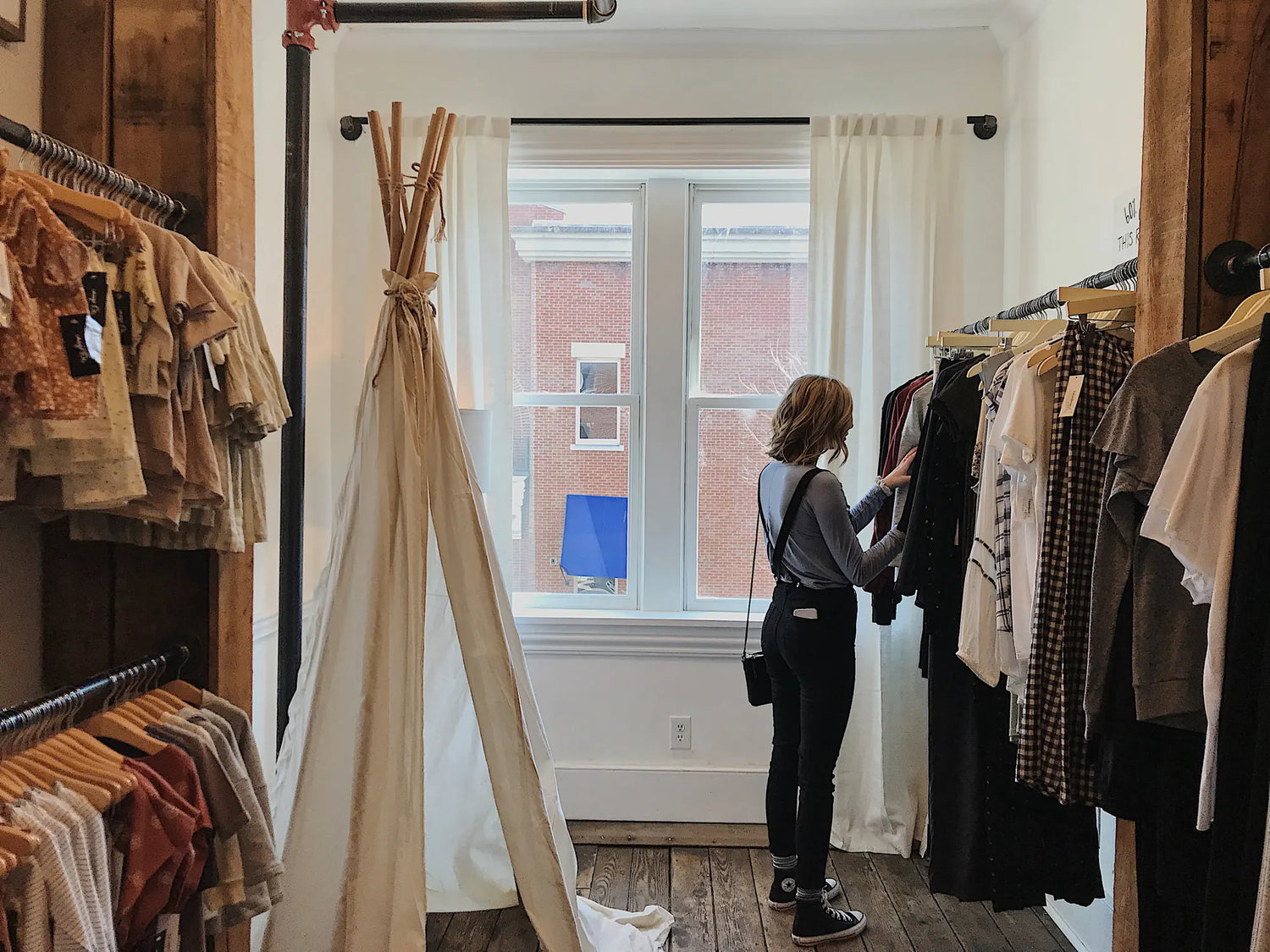 Clothing boutique, woman shopping