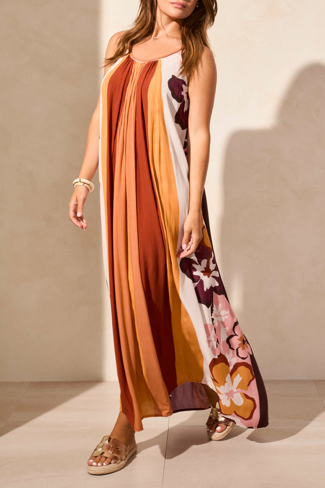 Long, flowy, maxi dress with spagetti straps in warm colors and tropical floral print - Tru Blue Boutique