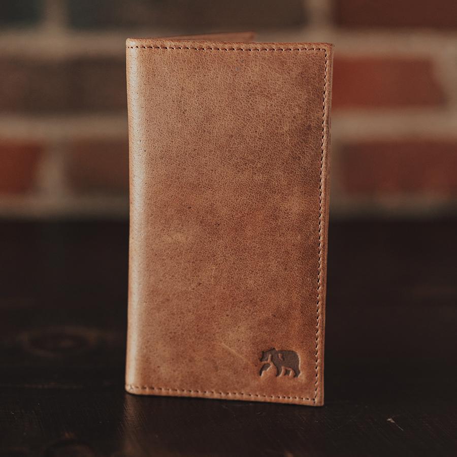 Tan Bison leather, 11 card pockets, 4 bill pockets 6.75" x 3.75 when closed.  The Normal Brand
