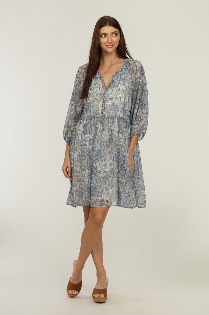 Chiffon tiered dress in floral print. Light blue Kriss Kriss print, with 3/4 sleeves and flowy styling for that easy going, yet feminine style by Veronica M