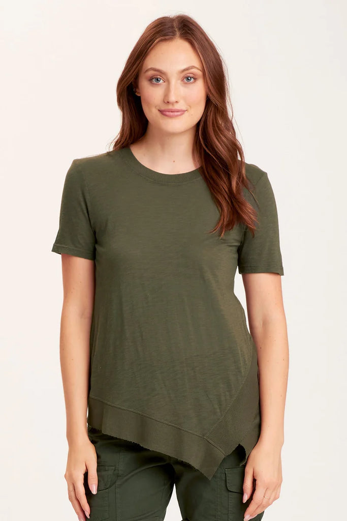 XCVI Wearables Lettie Tee in olive crew neckline, short sleeves, asymmetric hemline with rib detail, and a rib insert on side at Tru Blue Boutique